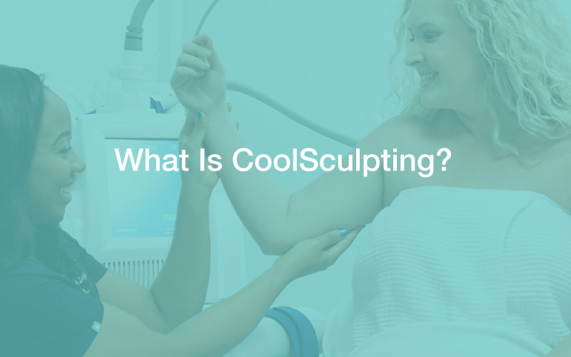 woman having upper arm fat area examined during CoolSculpting consultation